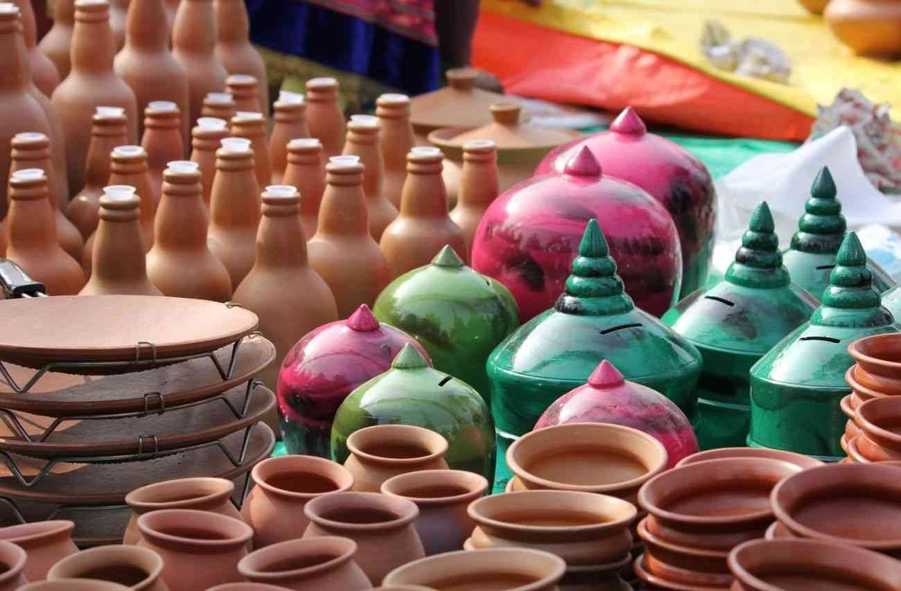 A collection of artisanal colorful handmade pots and ceramics