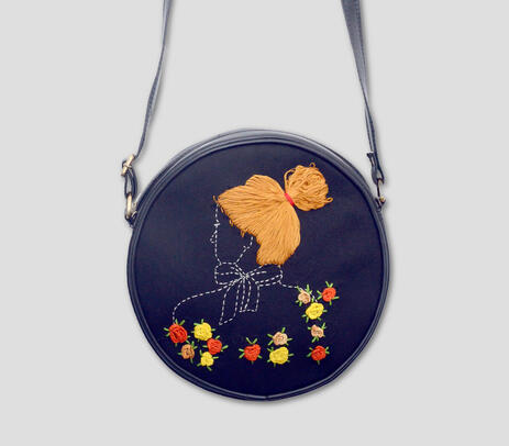 Embroidered cotton roundie sling bag