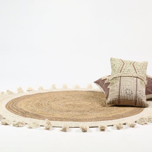 Hand braided tasseled jute rug