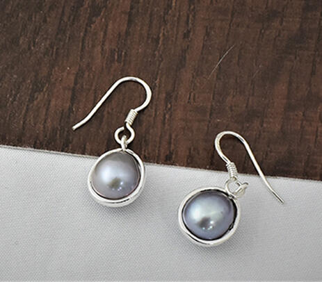 White pearl drop earrings