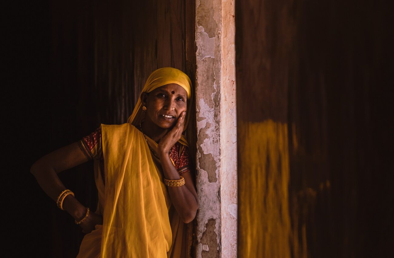 A rural woman smiling