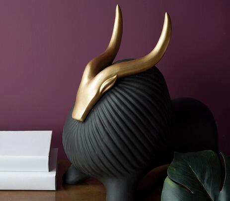 Golden horned yak table accent