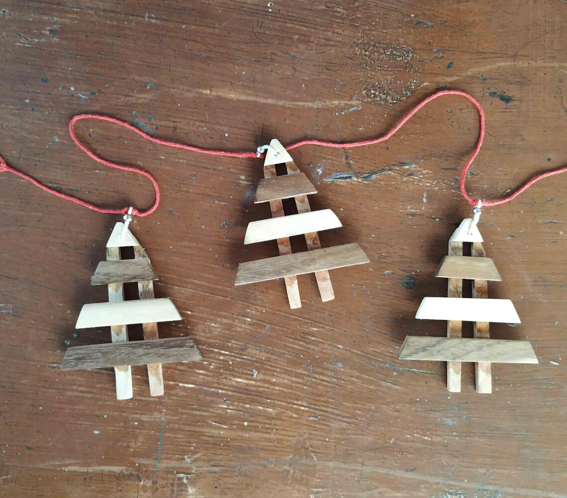 Hand cut siris wood christmas hanging tree garland