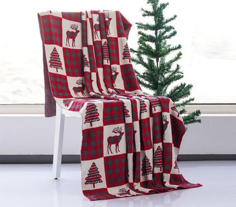 Knitted Cotton reindeer & tree checkered blanket