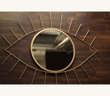 Gold toned evil eye mirror