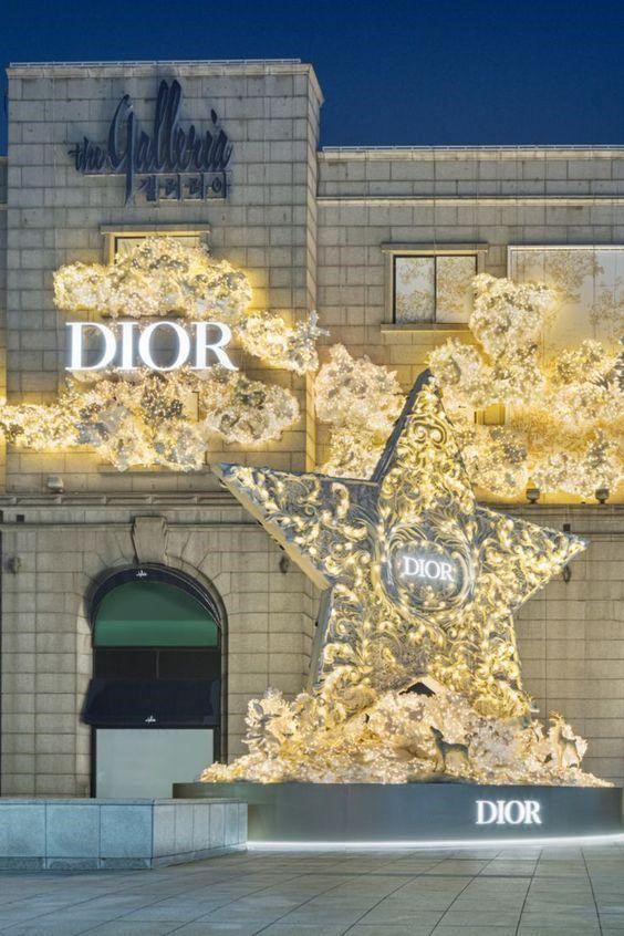 Dior storefront with a giant lit star