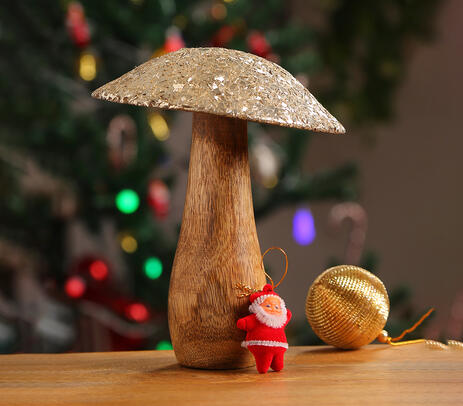 Hand carved wooden mushroom with silver mosaic