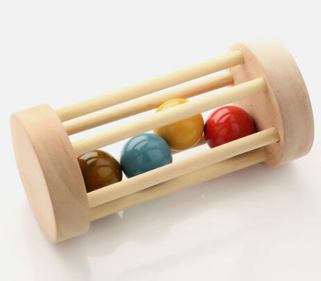 Hand carved wooden multicolored rolling rattle