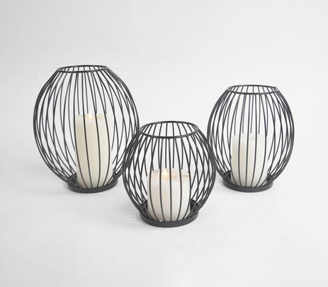 Minimal metallic caged candle holders