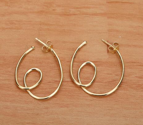 Brass golden earrings