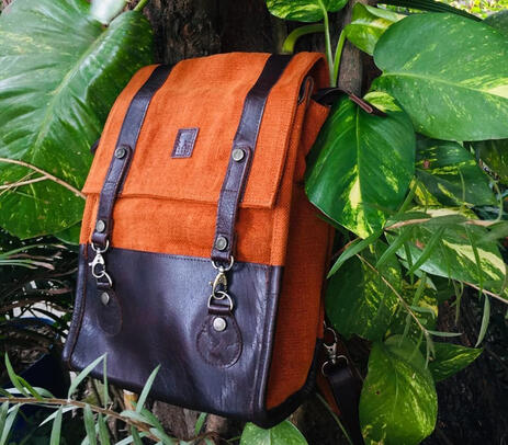 Hand stitched burlap orange backpack