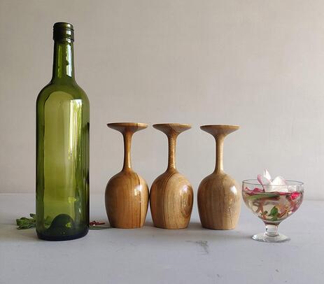 Wood turned teak wood wine glasses