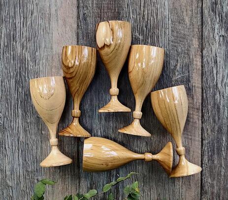 Wood turned teak wood wine glasses