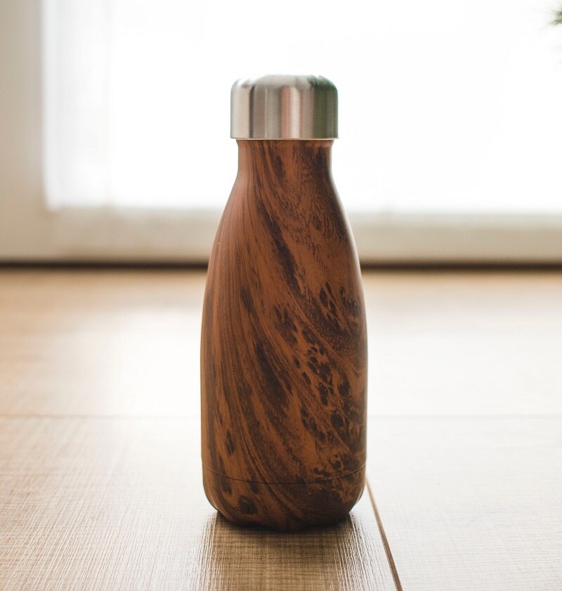 A sustainable wooden water bottle