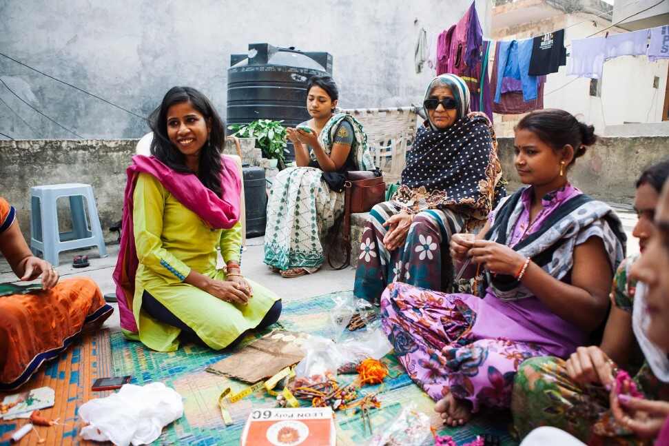 Brand's founder in conversation with women artisans