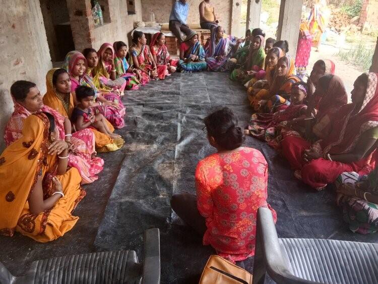 Rural women of Odisha sitting in a workshop