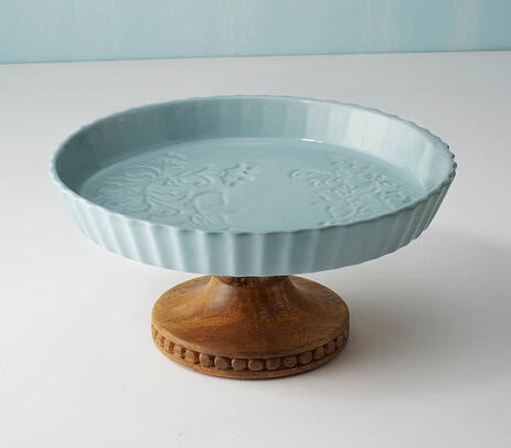 Ceramic cake stand with wooden base