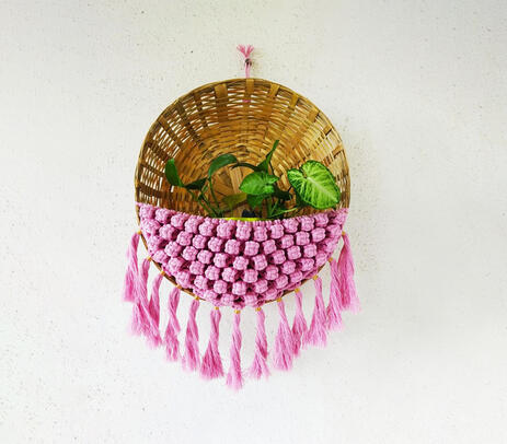 Tasseled macrame basket planter