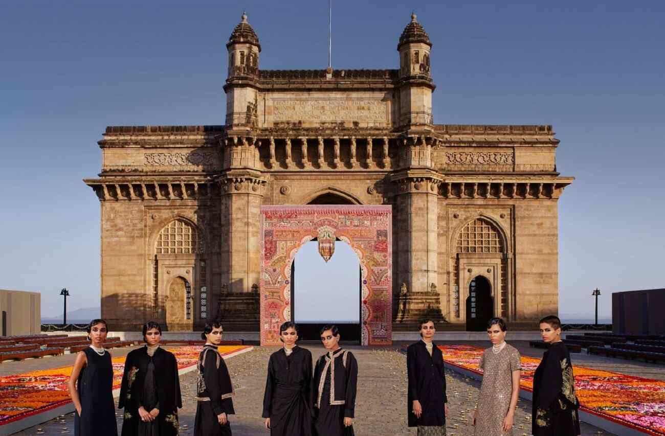 Dior's fashion show models in front of Gateway of India