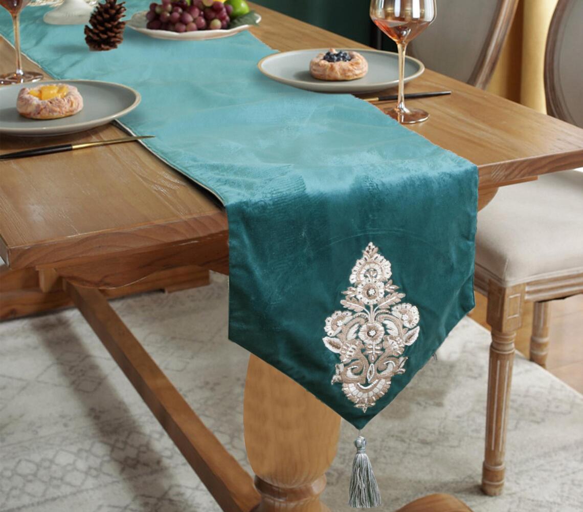 Embroidered teal table runner