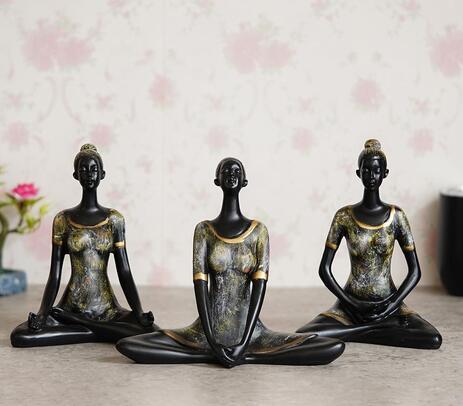 Handmade antique-finish yoga motif showpieces