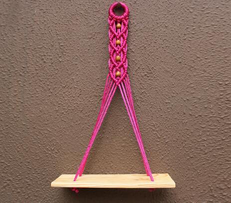 Pink macrame floating shelf