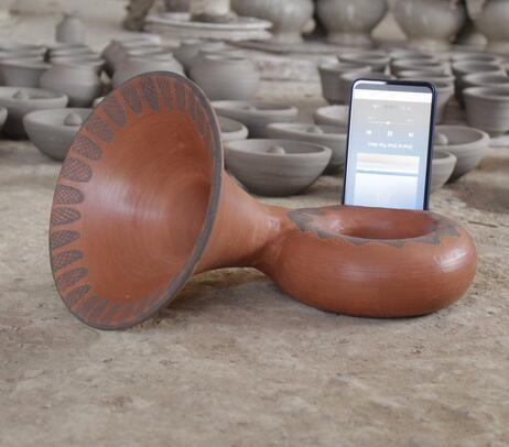 Handcrafted terracotta mobile amplifier & holder