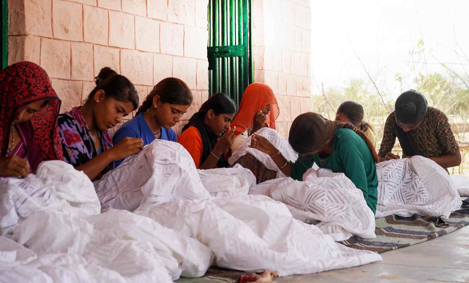 Women artisans practicing Applique (Khatwa) work