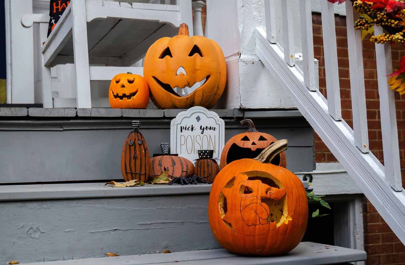 Carved pumpkins arranged on stairs