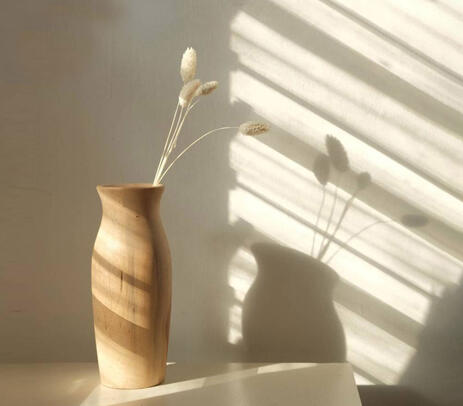 Wood turned teak wood vase