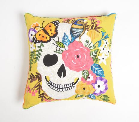 Crewel-embroidered botanical skull cushion cover
