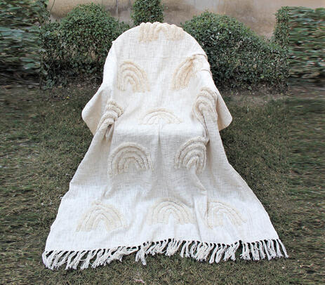 Hand tufted cotton tasseled throw