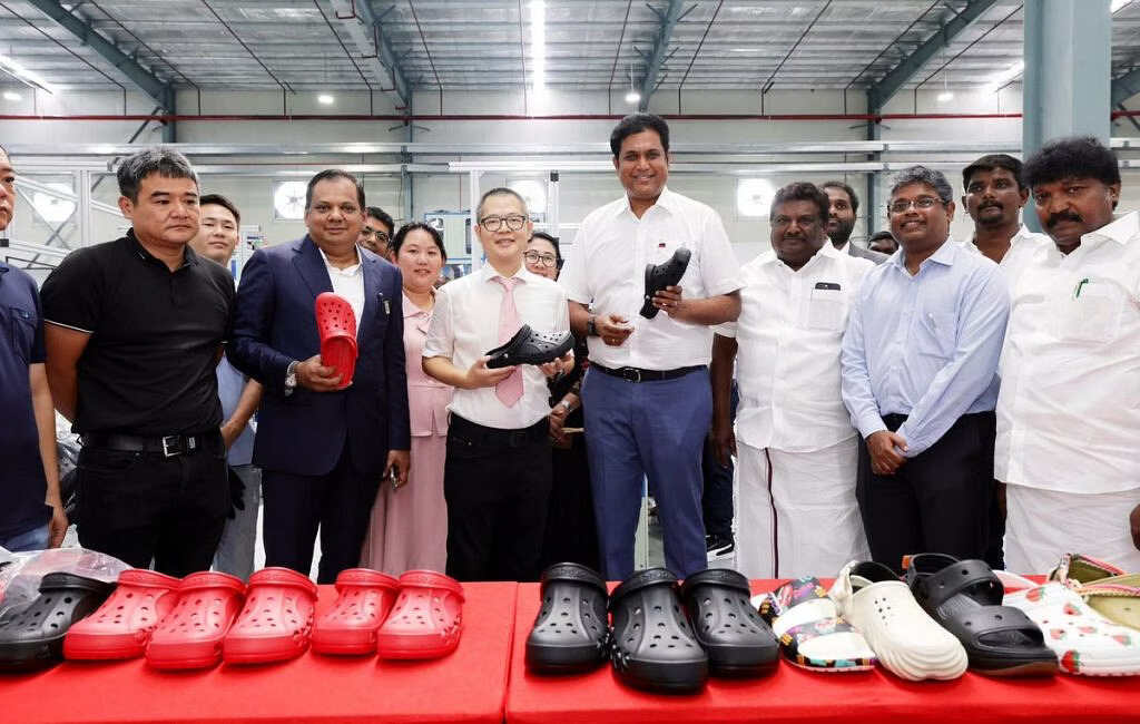 T R B Rajaa (centre), the Industries Minister of Tamil Nadu, at the Crocs manufacturing unit of the Perambalur footwear park